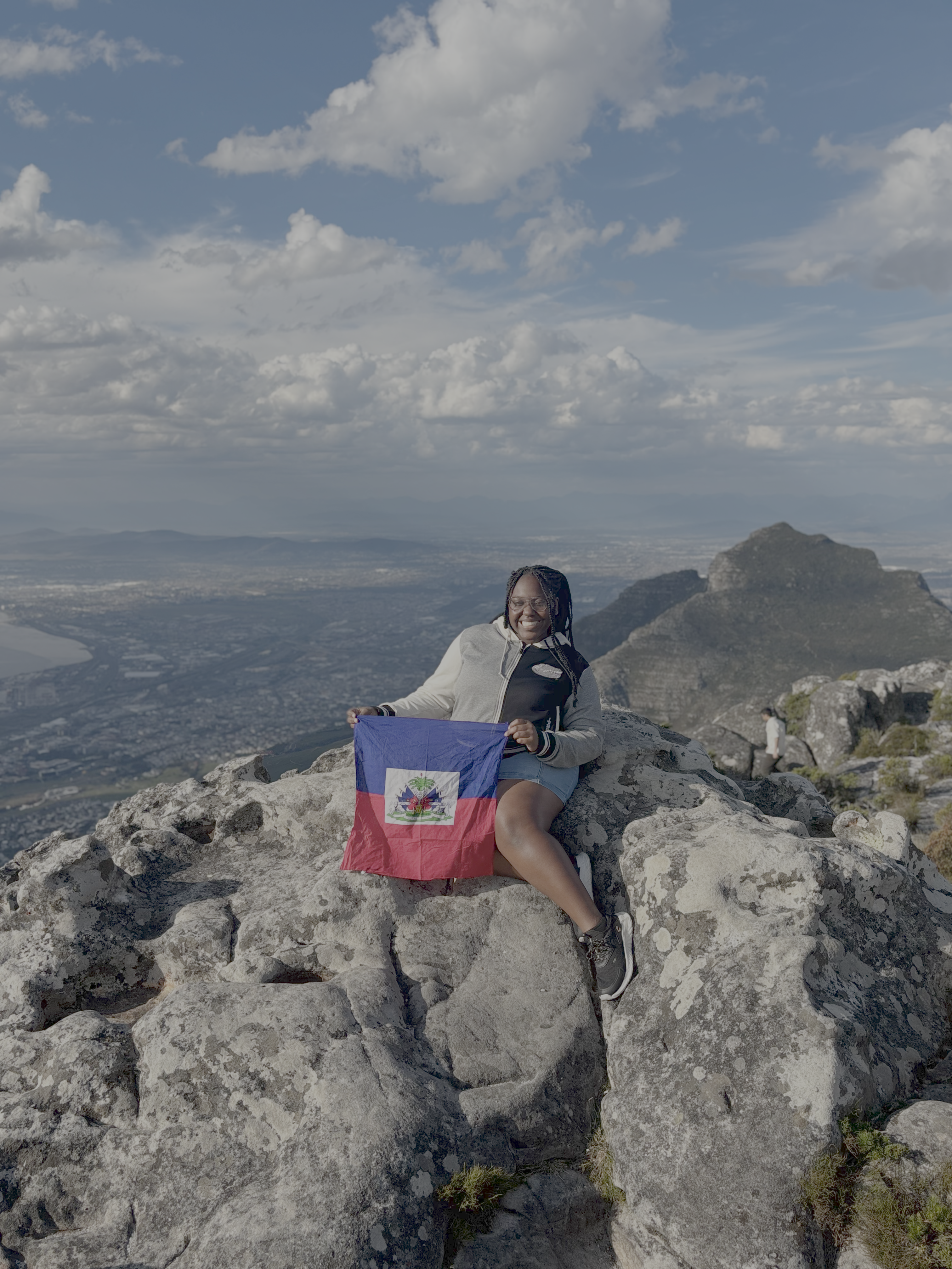 Sitting on table mountain with Haitian flag!